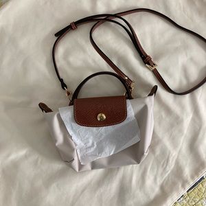Longchamp le pliage pouch with handle